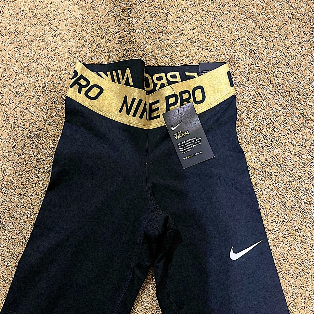 NWT* gold nike pro leggings
